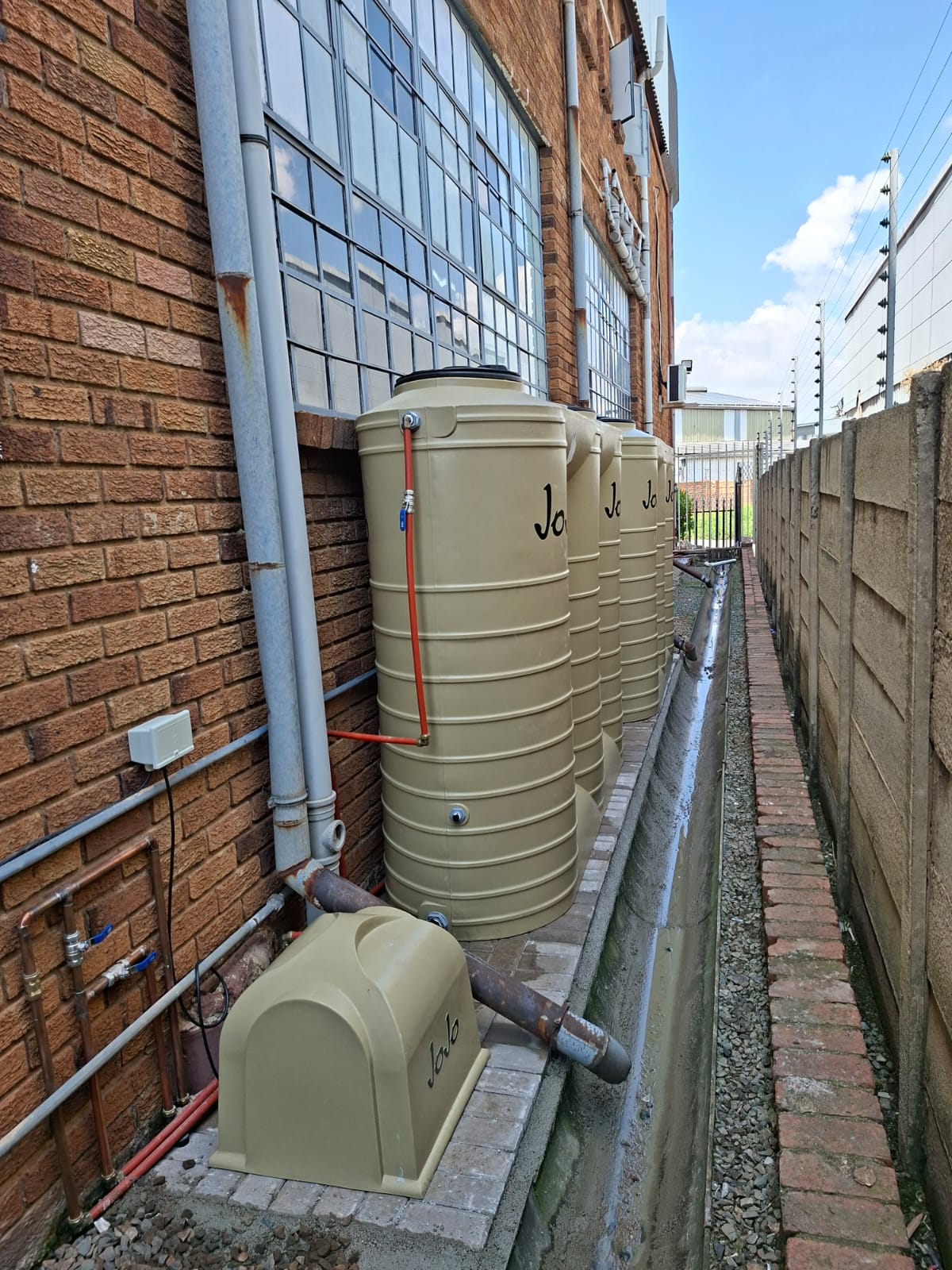 Completed water tank installation and pipework